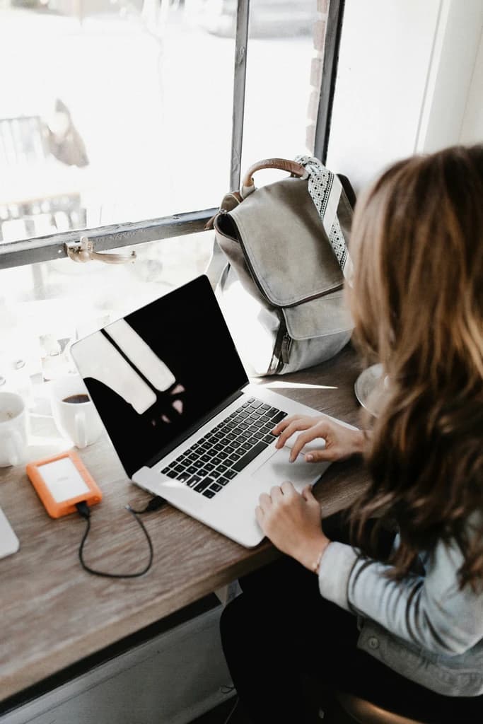 Image of a Girl learning with her Laptop